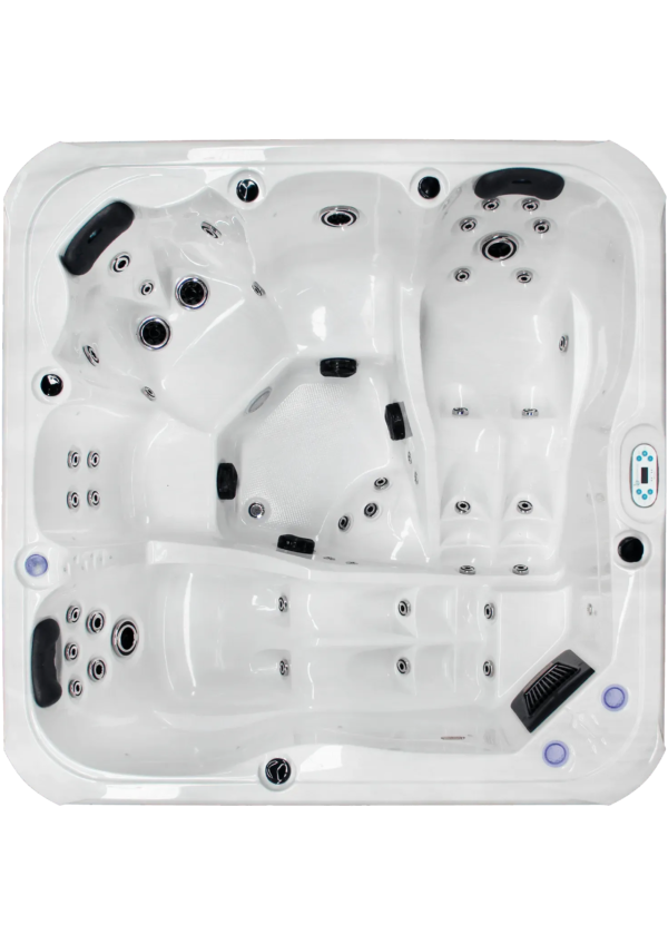 Cuve du Spa Sublime Line Gaïa avec finition acrylique blanche, assises ergonomiques et buses de massage stratégiquement placées.